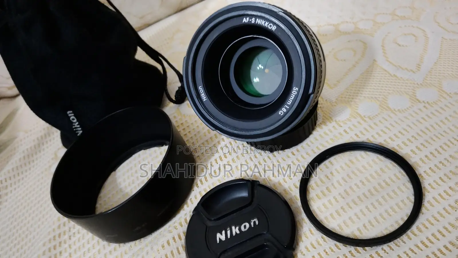 Nikon 50mm 1.8g Prime Lens with Caps, Hood, UV Filter and Pouch.