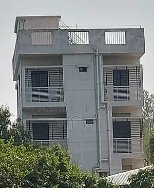 Vacant land and house with land