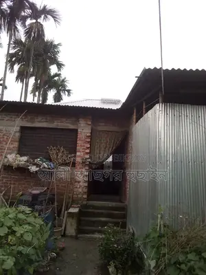 Land with house for sale, suitable for a small family. 12-foot road access.