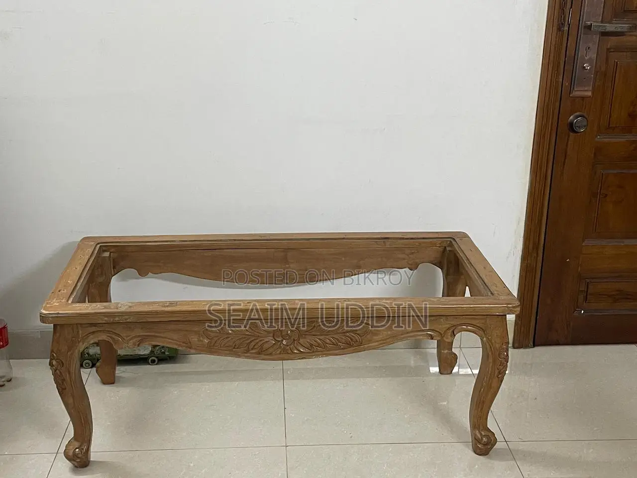 Teak wood tea table.