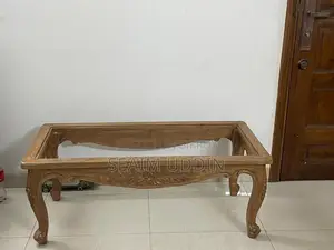 Teak wood tea table.