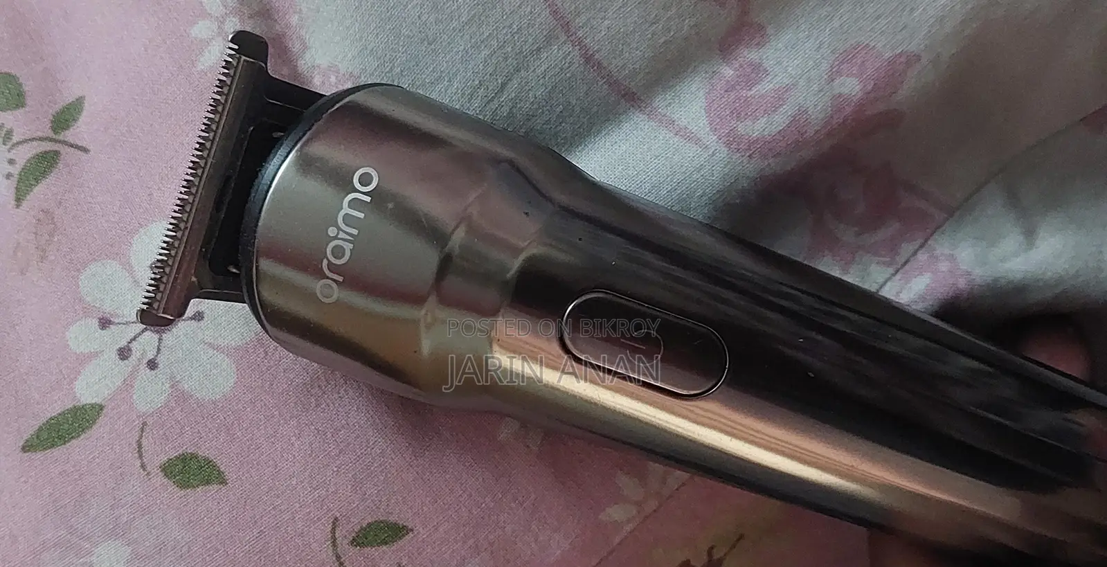 Oraimo ট্রিমার