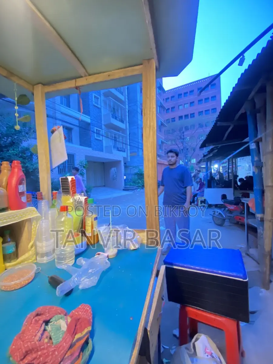 Permanent shop with food cart for sale next to East West University.