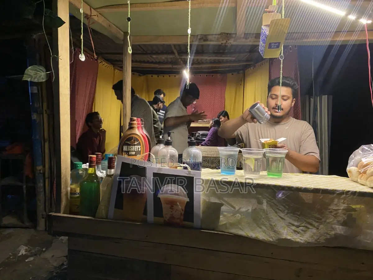 Permanent shop with food cart for sale next to East West University.