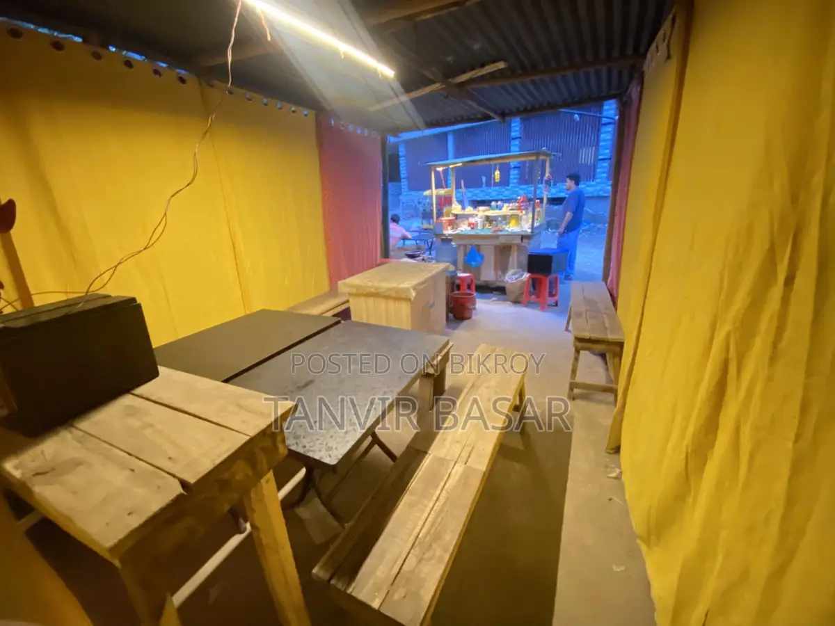 Permanent shop with food cart for sale next to East West University.