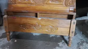 High-quality wooden bed for sale.