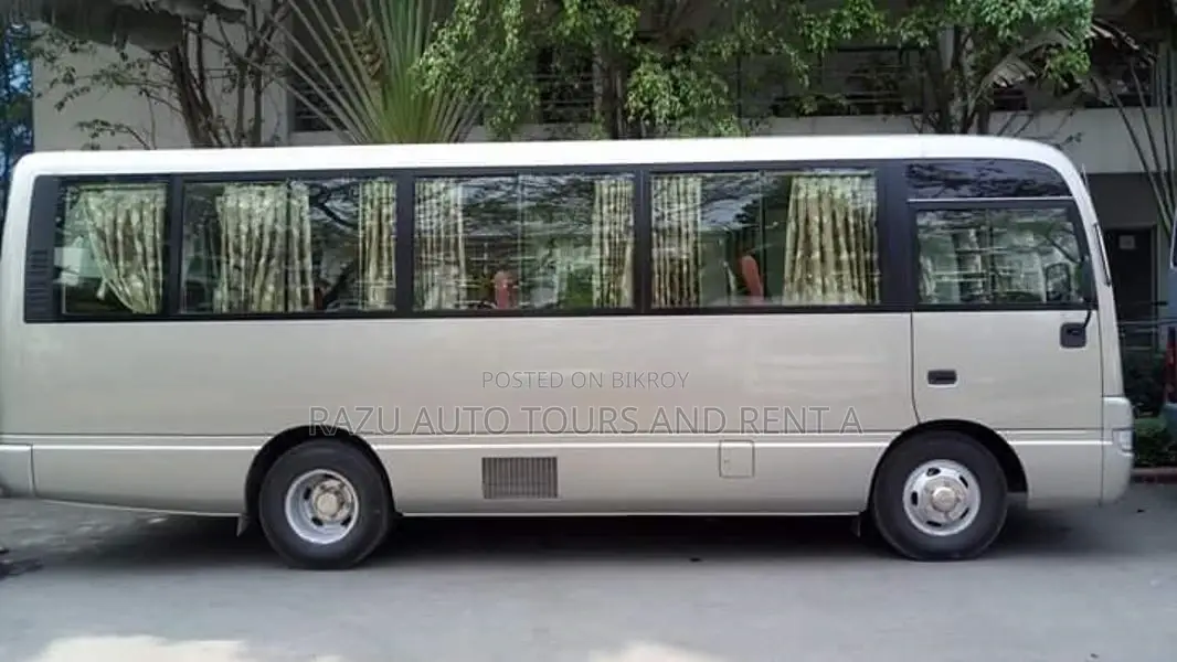 Nissan Ac Coster Bus For Rent. (28 Seat)