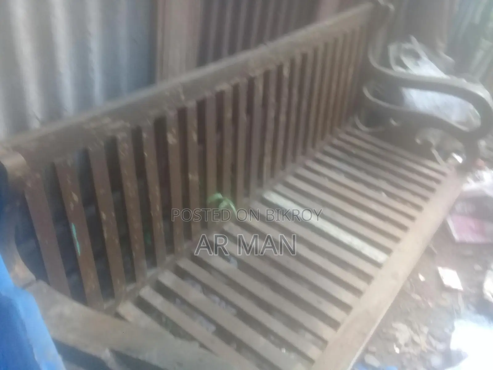 Broken Teak Sofa