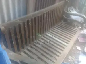 Broken Teak Sofa