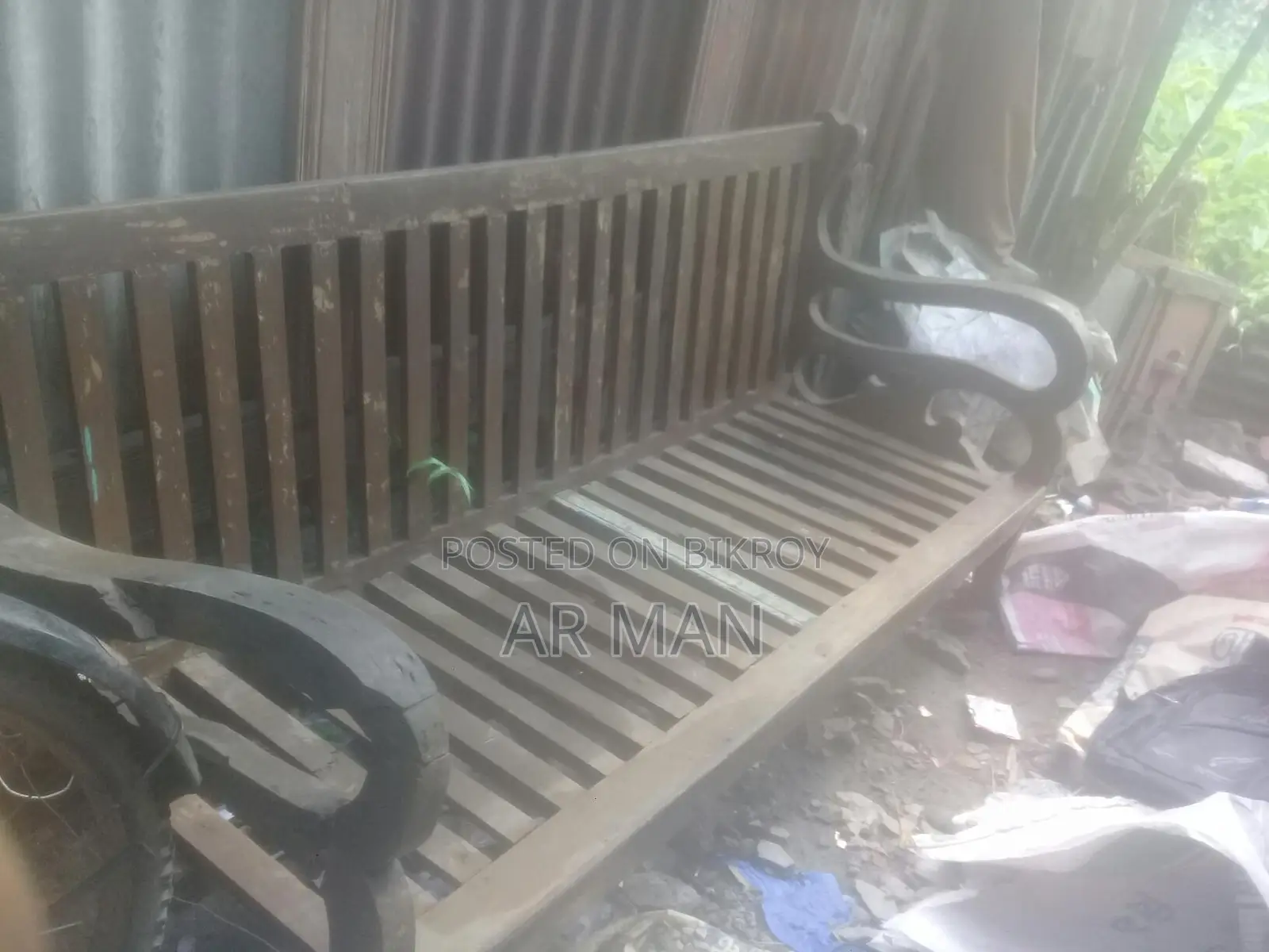 Broken Teak Sofa