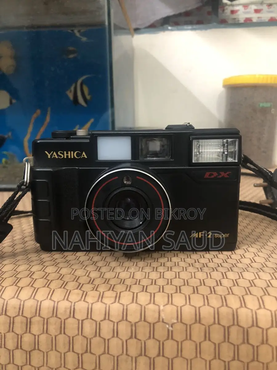 Yashica MF-2 Photo camera and antique piece
