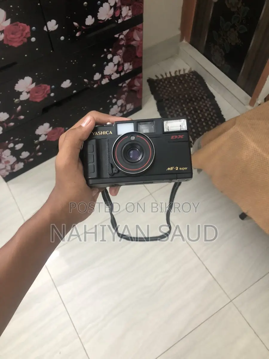 Yashica MF-2 Photo camera and antique piece