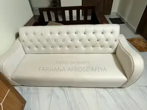 Sofa-cum-bed and White Cabinet