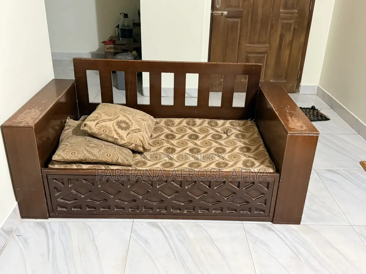 Sofa-cum-bed and White Cabinet