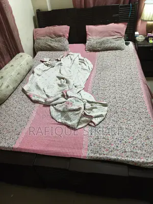 Bed, Mattress, and Bedside Table