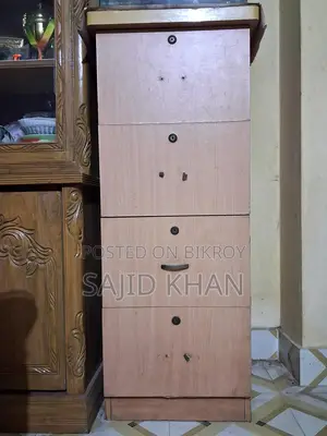 Single wardrobe/file cabinet for sale at a low price.