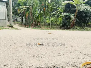 Beautiful land for sale in a residential area, adjacent to the government road.