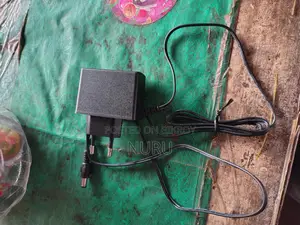 ১২ ভোল্ট অ্যাডাপ্টার চার্জার