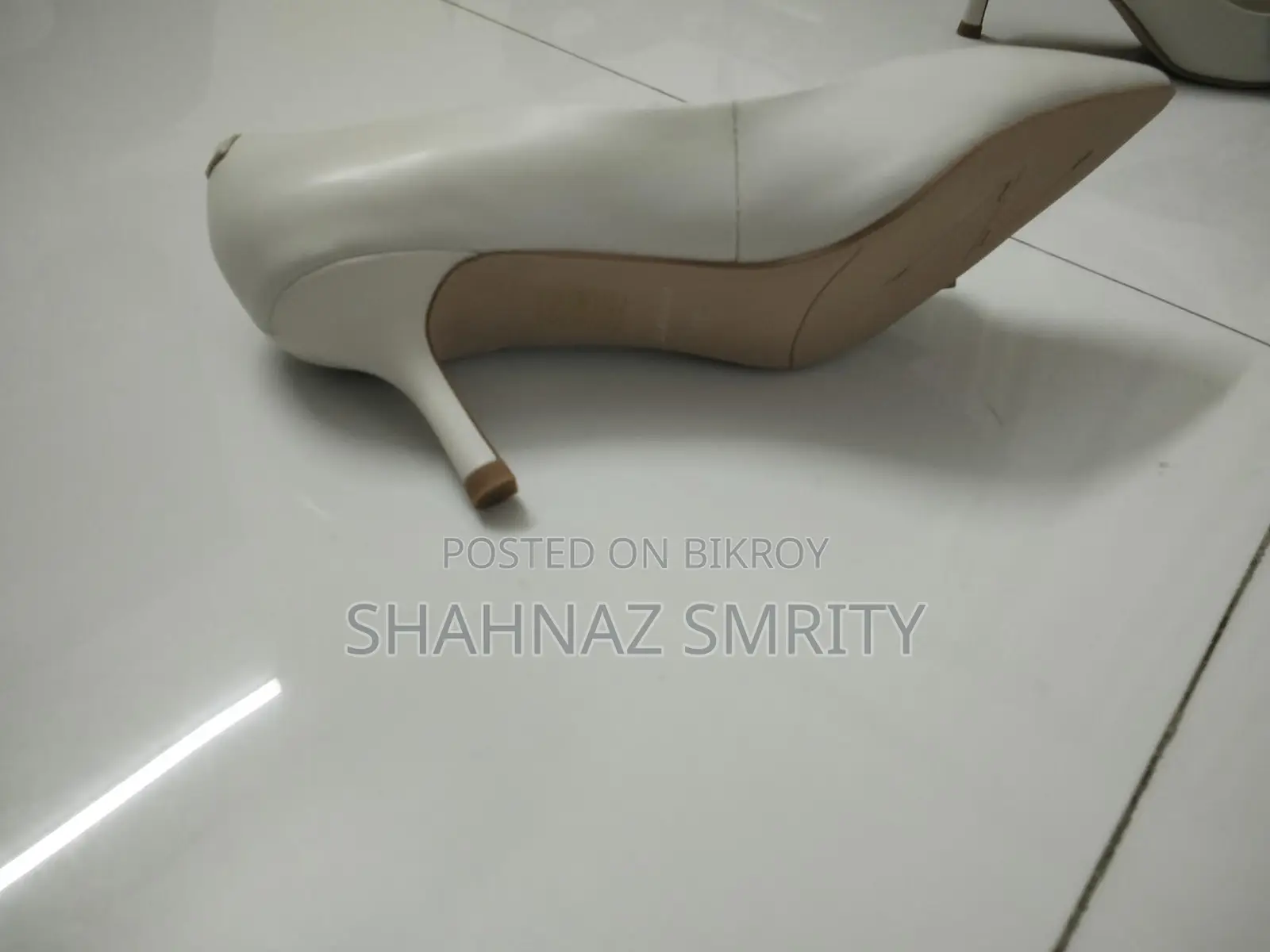 Two pairs of used new high heels