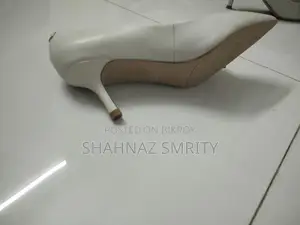 Two pairs of used new high heels