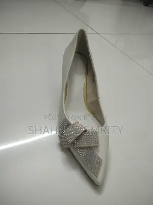 Two pairs of used new high heels