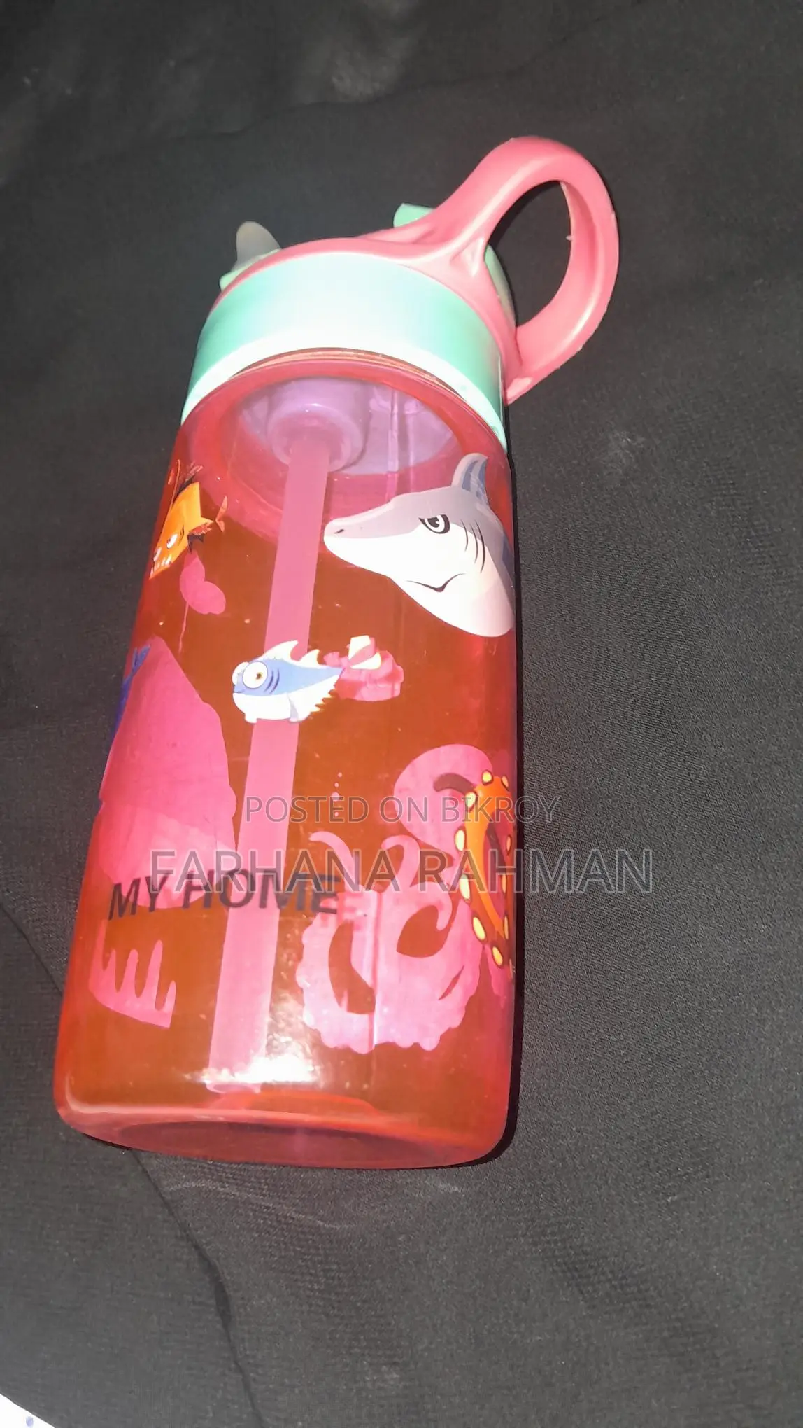 গোলাপি পানির বোতল