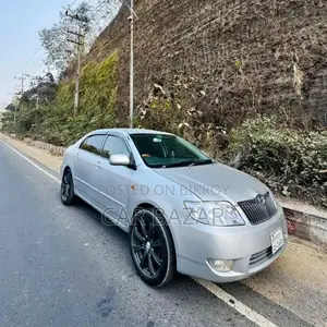 টয়োটা করোল্লা এক্স ঢাকা মেট্রো ২০০৪ সিলভার