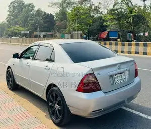টয়োটা করোল্লা এক্স ঢাকা মেট্রো ২০০৪ সিলভার