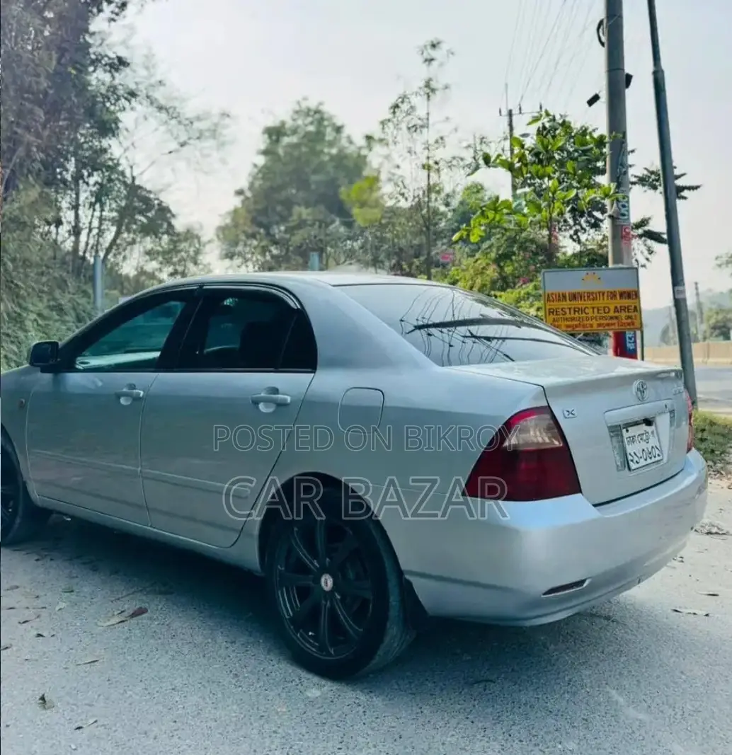 টয়োটা করোল্লা এক্স ঢাকা মেট্রো ২০০৪ সিলভার