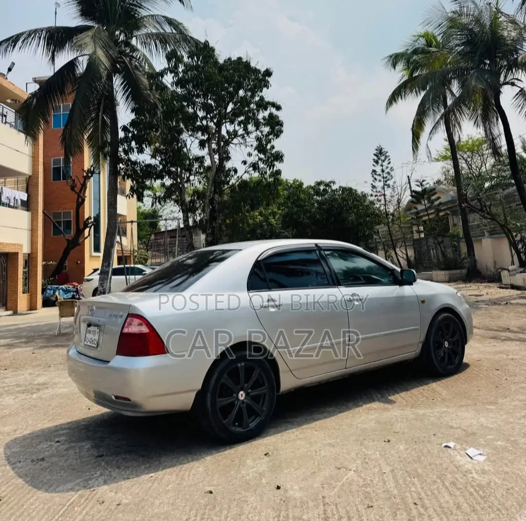 টয়োটা করোল্লা এক্স ঢাকা মেট্রো ২০০৪ সিলভার