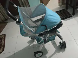 বেবি স্ট্রোলার (Baby Stroller)।