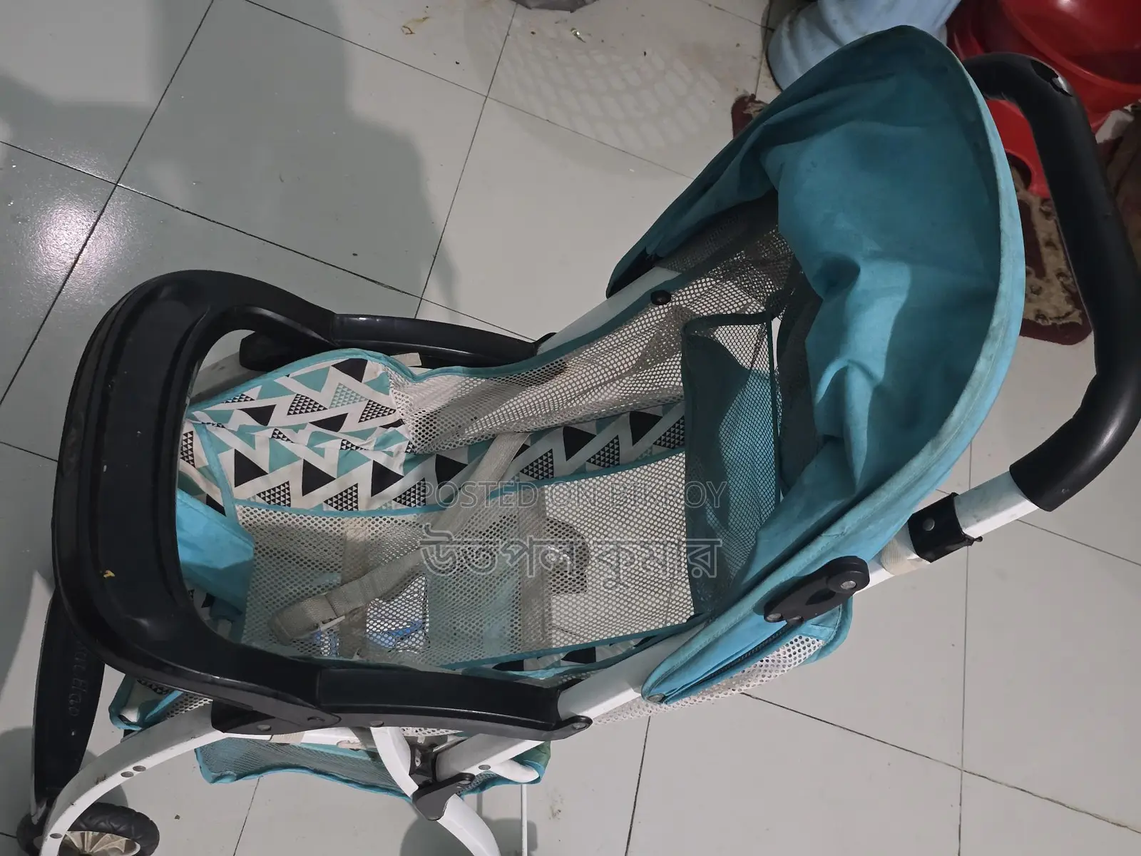 বেবি স্ট্রোলার (Baby Stroller)।