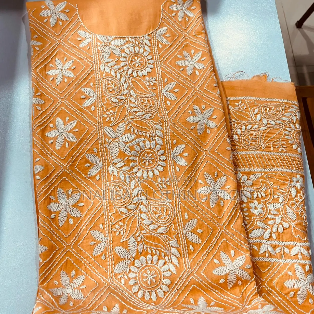 One-piece with complete hand-embroidery design