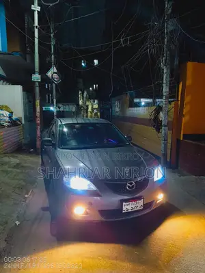 Mazda Axela . 2005