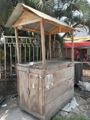 A wooden cart for tea, pitha, Chinese food, various types of snacks, etc.
