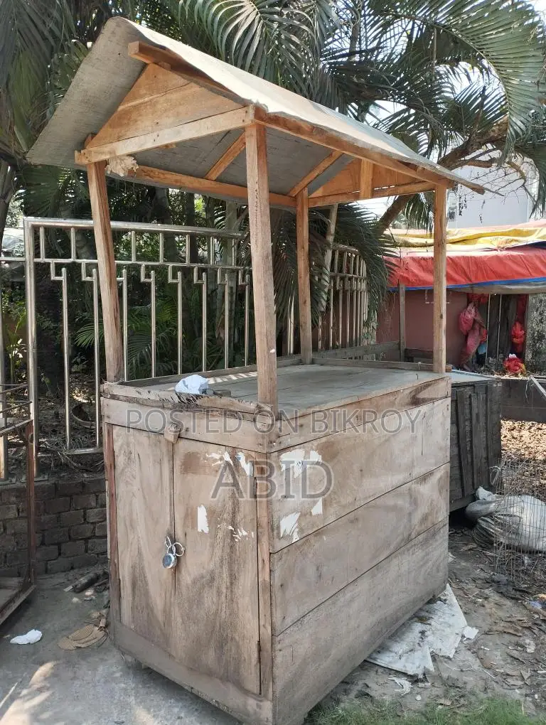 A wooden cart for tea, pitha, Chinese food, various types of snacks, etc.