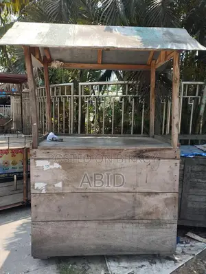 A wooden cart for tea, pitha, Chinese food, various types of snacks, etc.