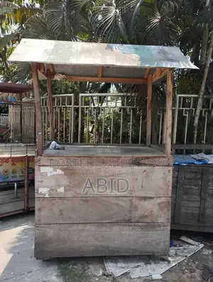 A wooden cart for tea, pitha, Chinese food, various types of snacks, etc.