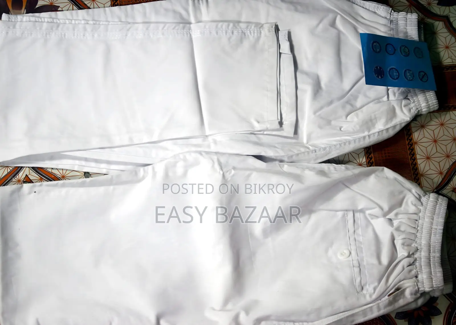 White stretch and cotton check trousers