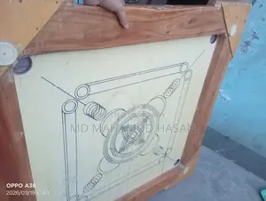 একটি কেরাম বোর্ড ব ব্যবহারিত