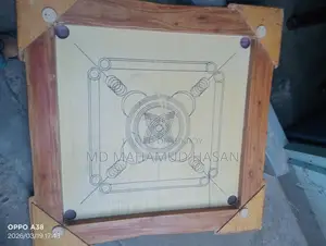 একটি কেরাম বোর্ড ব ব্যবহারিত