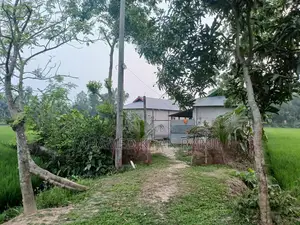 Land with house for sale.
