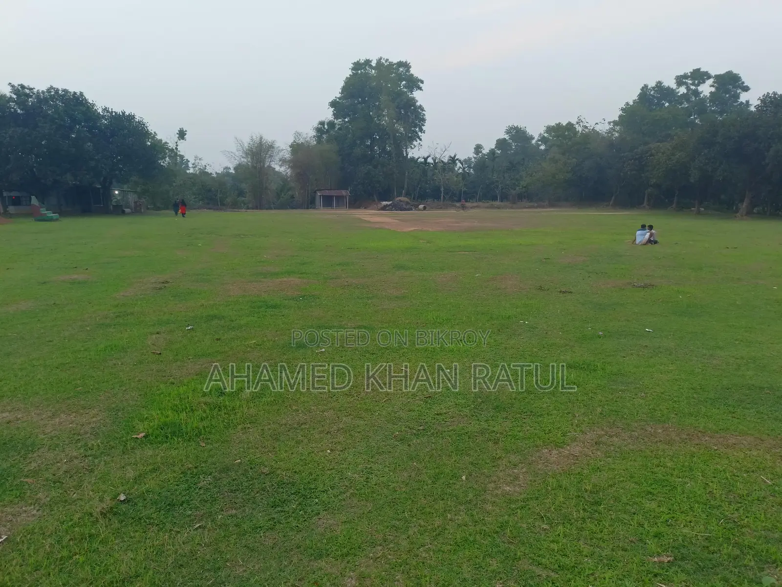 Land with house for sale.