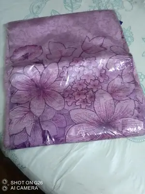 Three net curtains for sale.