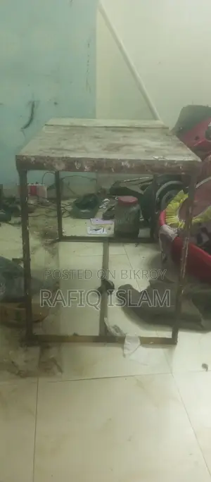 Iron table for sale.