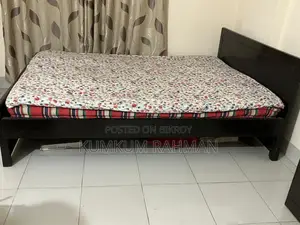Wooden Bed- 5' X 7'