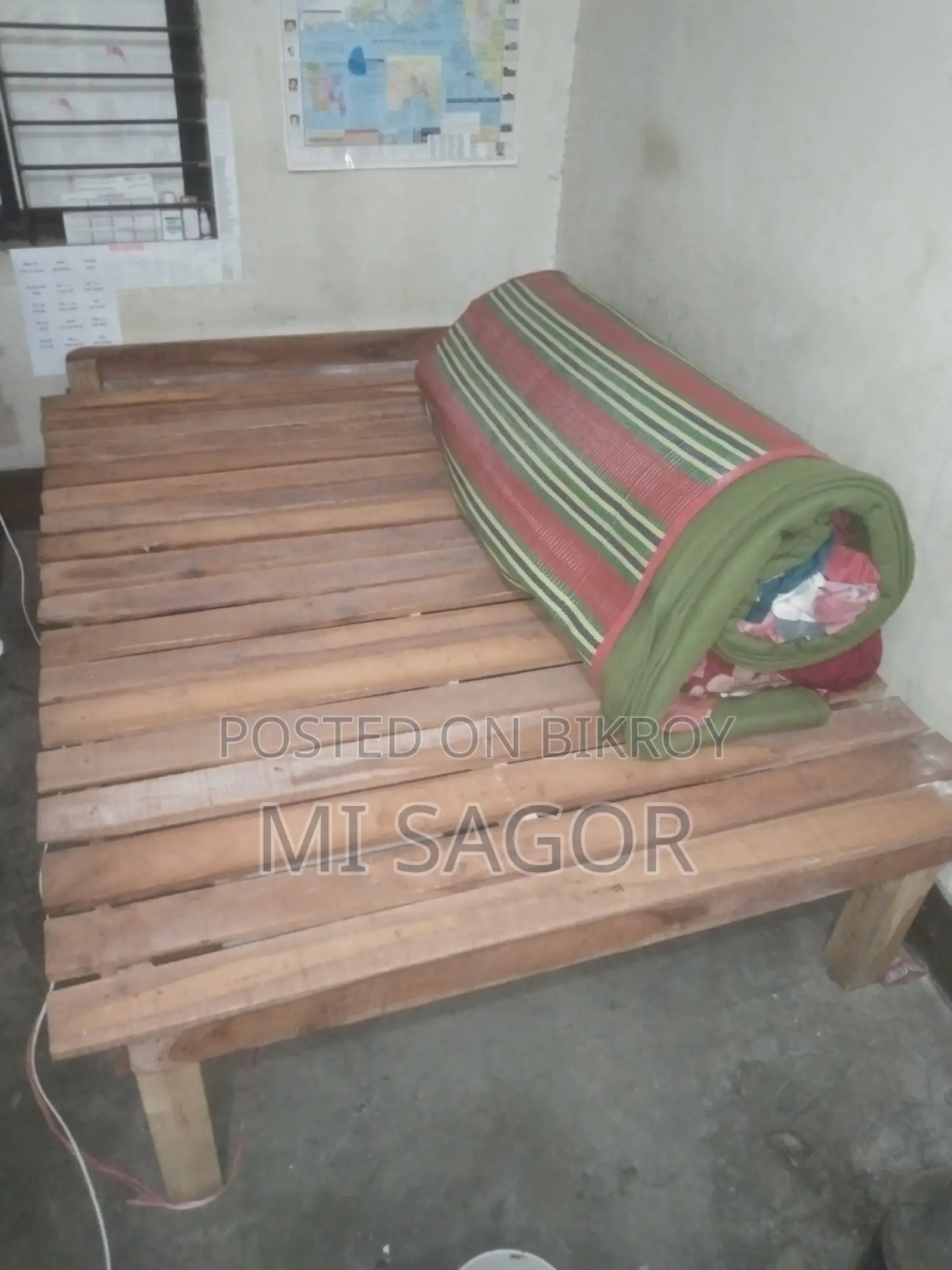 Double bed and wooden table