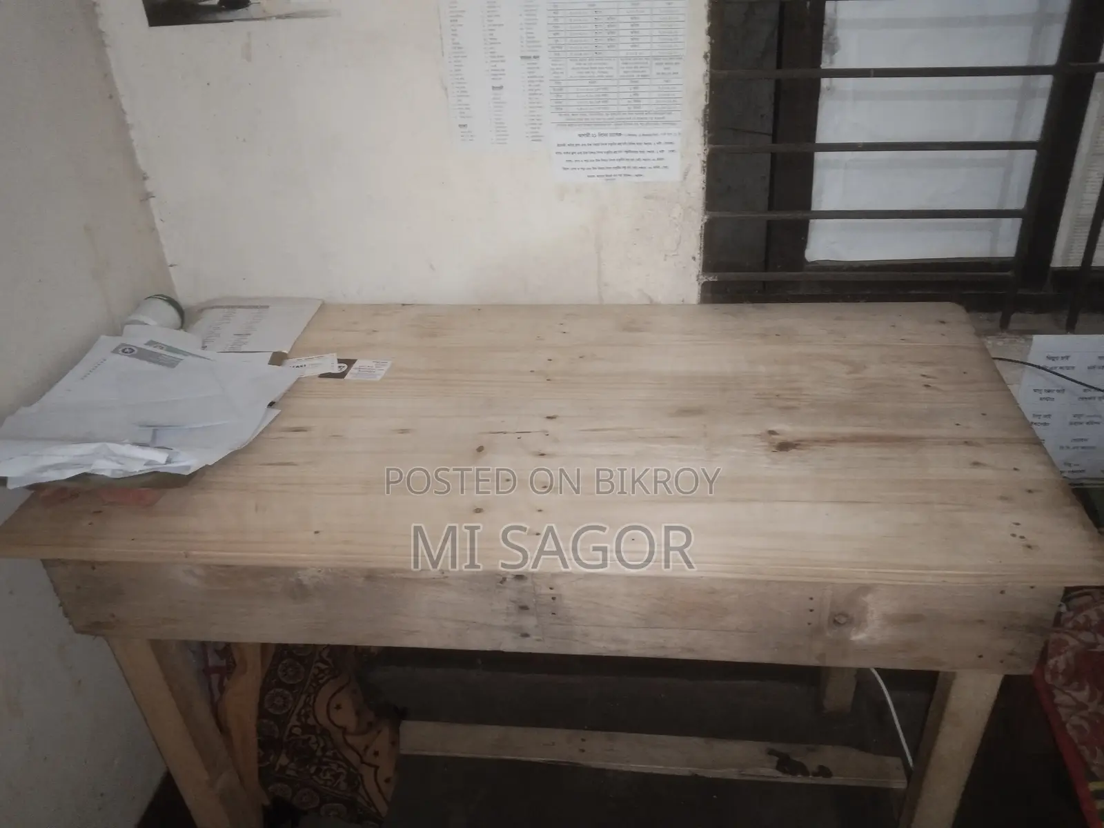 Double bed and wooden table