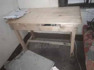 Double bed and wooden table