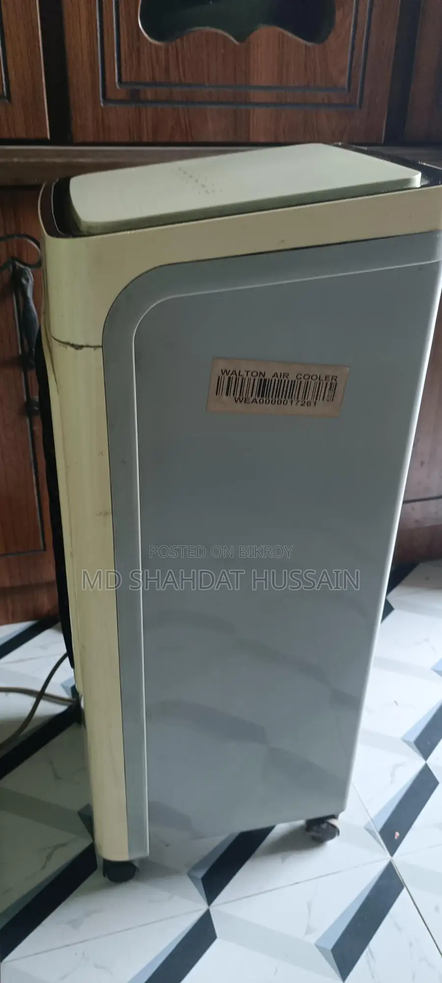 এটা একটা ওয়ালটন কোম্পানি এয়ার কুলার একটু সার্ভিস করতে হবে